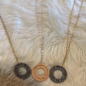 Elegant Gold and Black Pendant Necklace Trio
